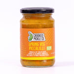 Piccalilli served alongside a pork pie and cheddar cheese